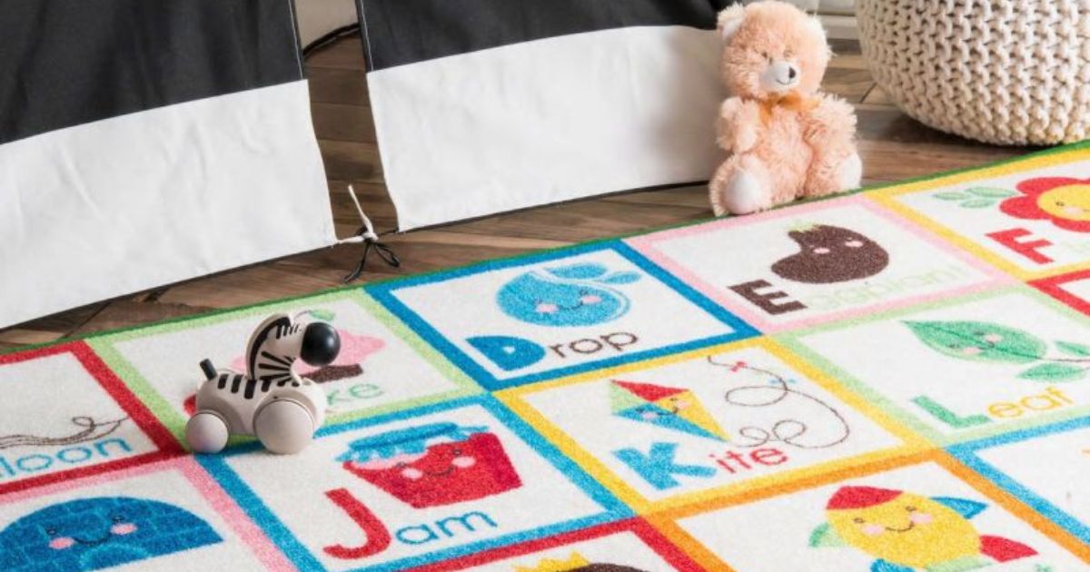 kids alphabet rug on floor