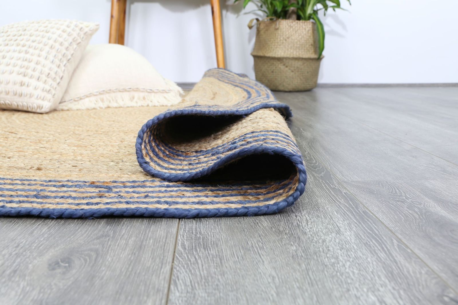 jute rug rolled up at edges