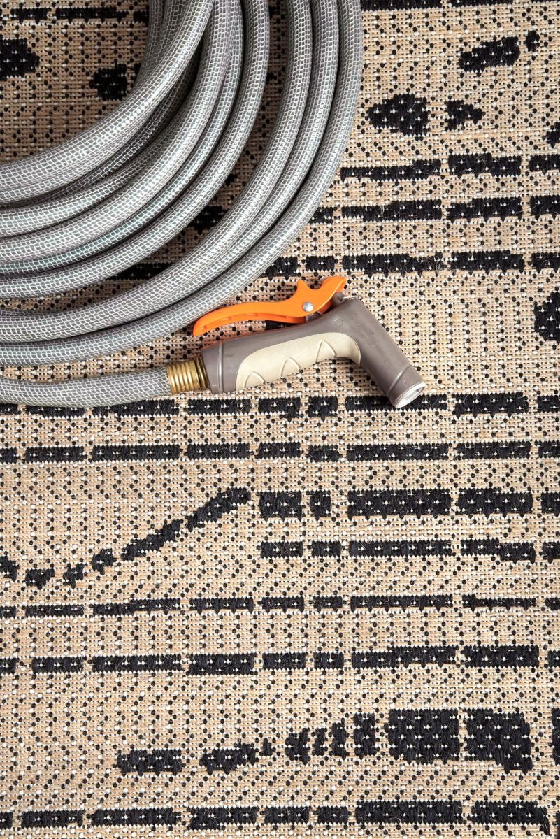 jute rug with a hose