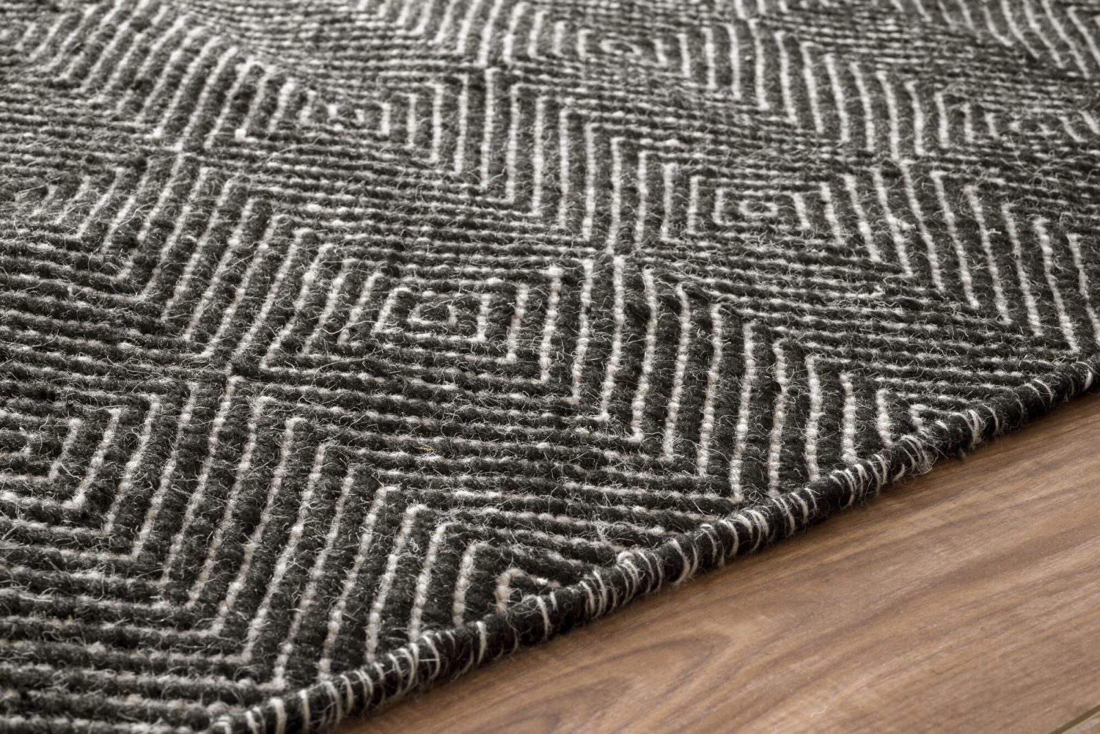 wool rug on wooden floor