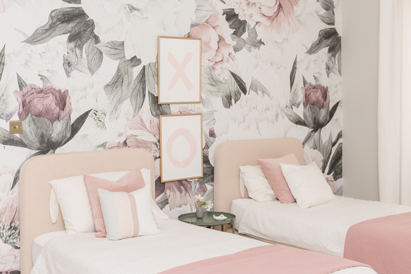 floral feature wall in girl’s bedroom