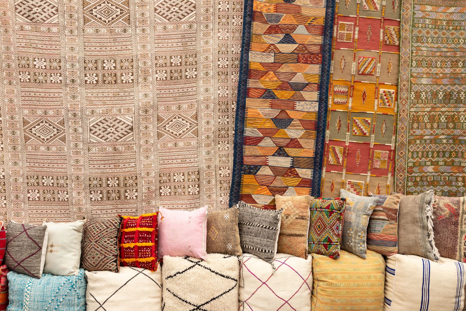 moroccan cushions and rugs on street