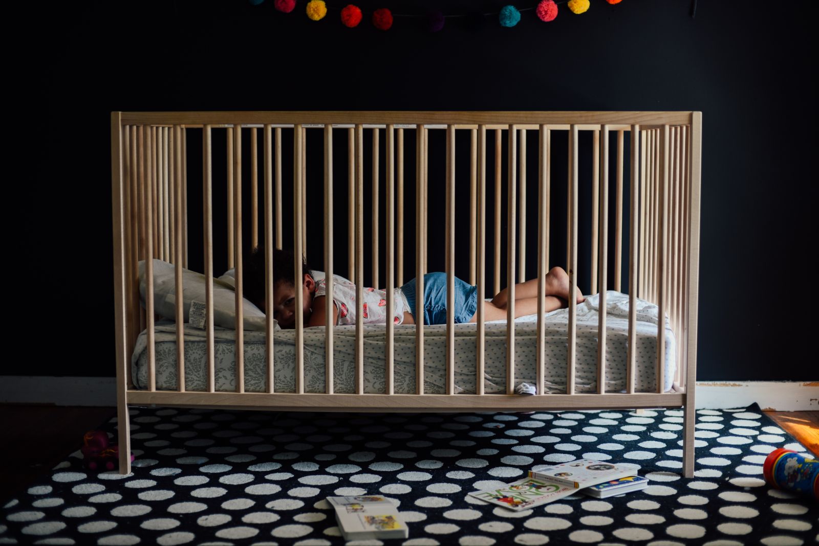baby in nursery crib